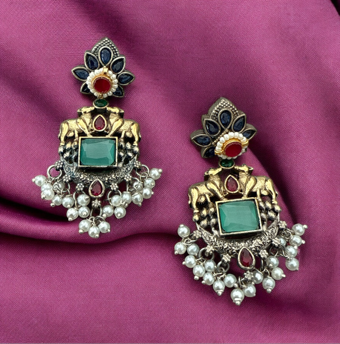 Oxidized Brass Cow Motif Earrings with Kundan and Pearl Drops