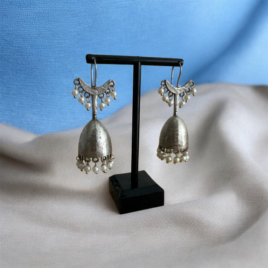 Dual-Toned textured long jhumka with hanging pearl handcrafted earrings